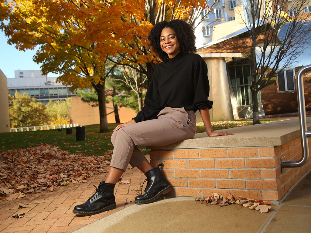 Portrait of mechanical engineering senior Orisa Coombs outside the Stata Center at MIT.